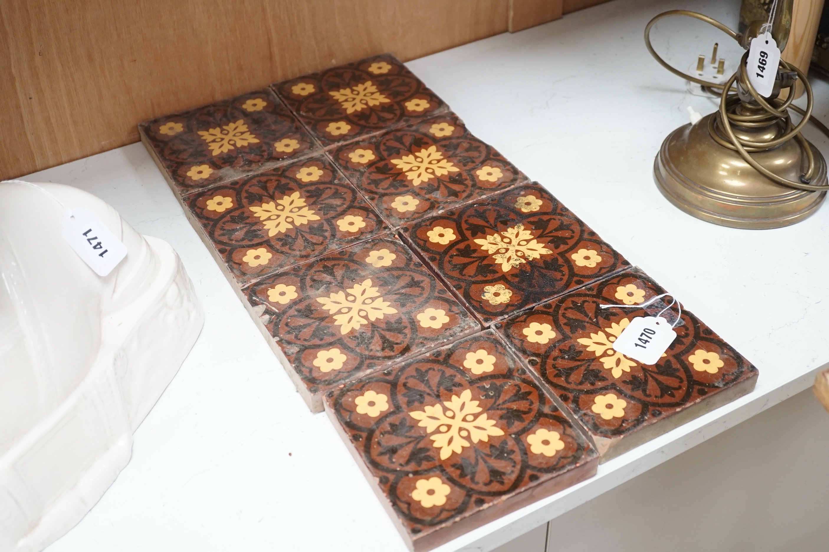 Eight Minton type encaustic tiles, 15cm x 15cm